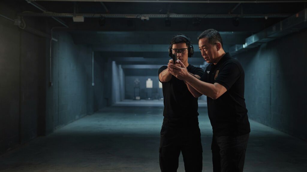 ARCANE instructor coaching a shooter during a training course